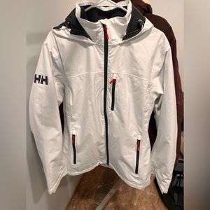 White Helly Hansen jacket, waterproof. Never worn size XL